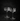 Two crystal glasses on a dark background